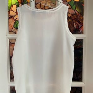 White sheer sleeveless blouse